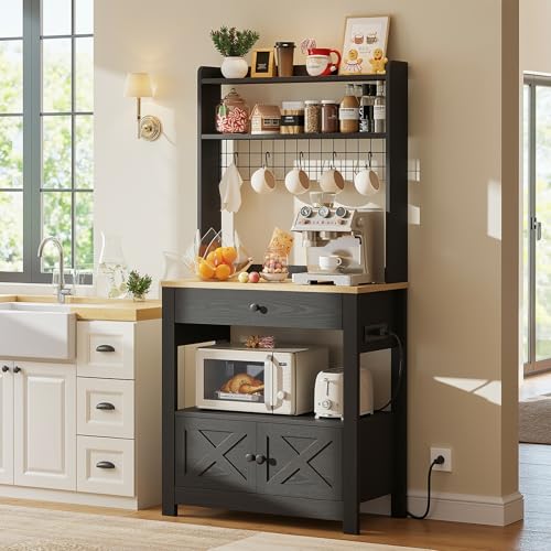 LIKIMIO Baker Rack with Spill-Safe Power Outlet & Drawer, Black | Coffee Bar Cabinet with Storage, Farmhouse Microwave Stand with Hutch and 5 Hooks for Kitchen - color: Black