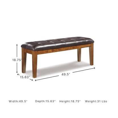 Signature Design by Ashley Ralene Tufted Upholstered Dining Room Bench, Medium Brown | Plush wipe-clean faux leather cushion, Frame of veneers, wood and engineered wood, Versatile 2-person entryway seating - color: Medium Brown, style: Ralene Dining Bench
