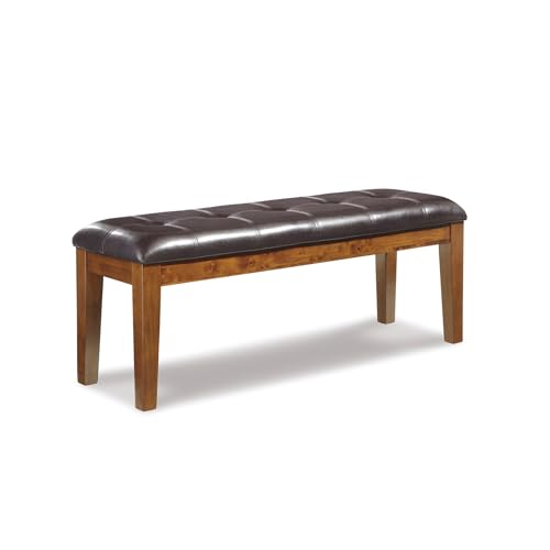 Signature Design by Ashley Ralene Tufted Upholstered Dining Room Bench, Medium Brown | Plush wipe-clean faux leather cushion, Frame of veneers, wood and engineered wood, Versatile 2-person entryway seating - color: Medium Brown, style: Ralene Dining Bench