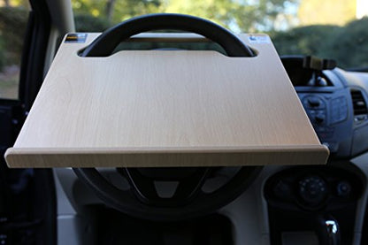 The Notebook steering wheel desk measures 15″ × 13 1/8.″ This compact WheelDesk provides a stable surface for most laptops, tablets, phones, or paperwork.