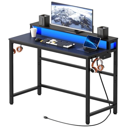 YATINEY Small Computer Desk with Charging Station and LED Lights, Gaming Desk with Monitor Stand, 2-Tier Home Office Desk with 4 Side Hooks, for Living Room, Home Office, Black DN01UDBBY2 - color: Black