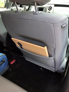 The Notebook steering wheel desk measures 15″ × 13 1/8.″ This compact WheelDesk provides a stable surface for most laptops, tablets, phones, or paperwork.