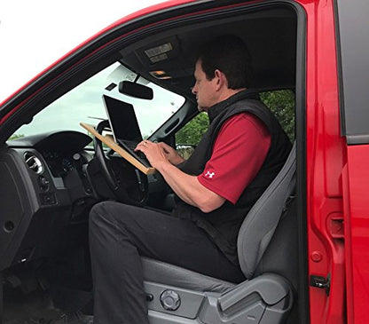 The Notebook steering wheel desk measures 15″ × 13 1/8.″ This compact WheelDesk provides a stable surface for most laptops, tablets, phones, or paperwork.