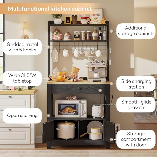 LIKIMIO Baker Rack with Spill-Safe Power Outlet & Drawer, Black | Coffee Bar Cabinet with Storage, Farmhouse Microwave Stand with Hutch and 5 Hooks for Kitchen - color: Black