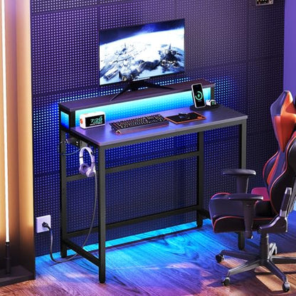 YATINEY Small Computer Desk with Charging Station and LED Lights, Gaming Desk with Monitor Stand, 2-Tier Home Office Desk with 4 Side Hooks, for Living Room, Home Office, Black DN01UDBBY2 - color: Black