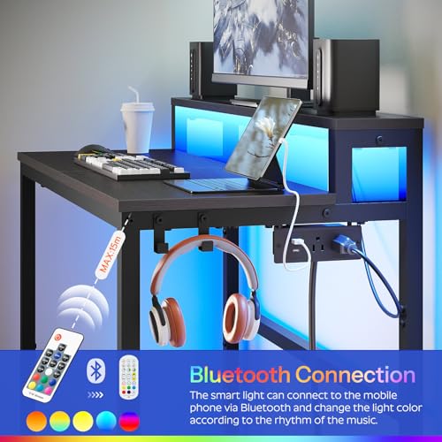 YATINEY Small Computer Desk with Charging Station and LED Lights, Gaming Desk with Monitor Stand, 2-Tier Home Office Desk with 4 Side Hooks, for Living Room, Home Office, Black DN01UDBBY2 - color: Black