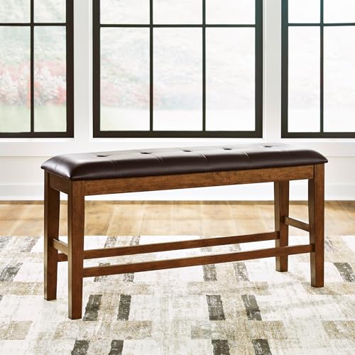 Signature Design by Ashley Upholstered Counter Height Dining Bench, Brown | Space-saving 50-in backless solid wood frame, Plush combination of leather and faux leather cushion, Ralene Series - color: Medium Brown, style: Counter Height Bench